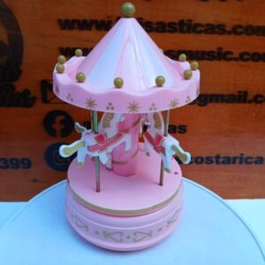 Carrusel giratorio rosado, sin música