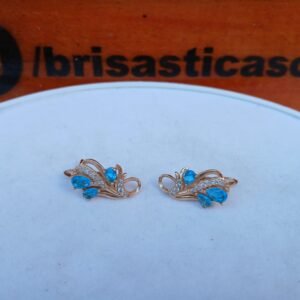 Aretes dorados con perlas celestes acero inoxidable